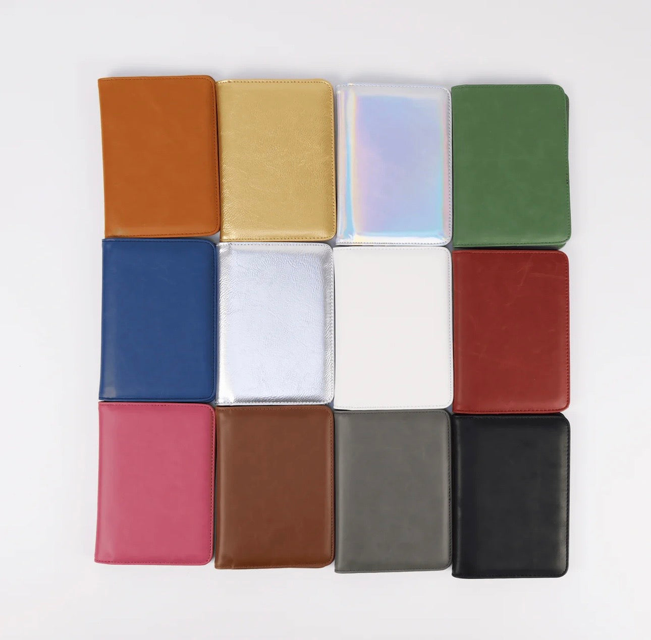 Grid of various colored leather passport wallets on a white background