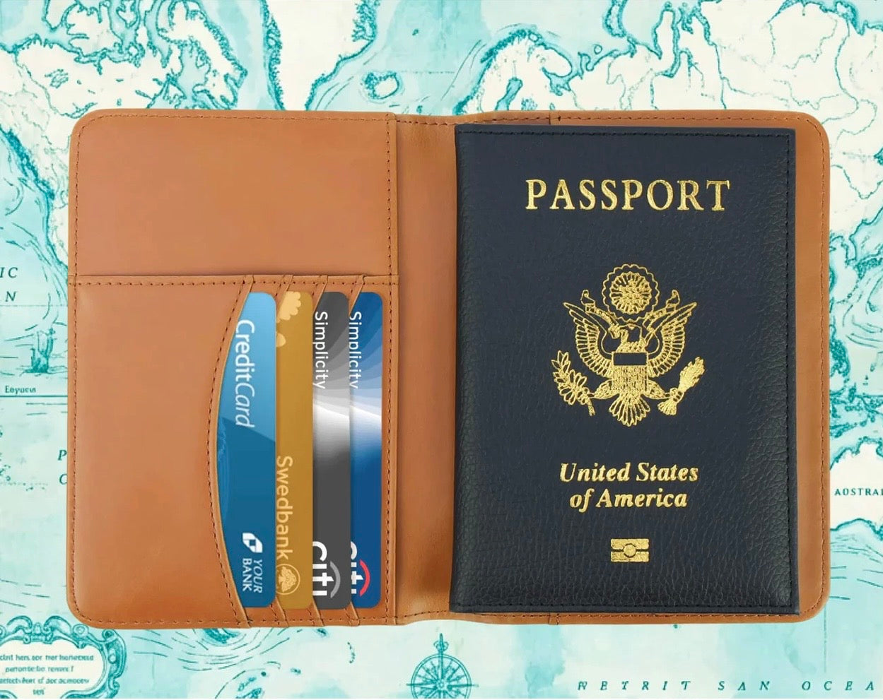 Passport holder with a passport and two credit cards on a world map background