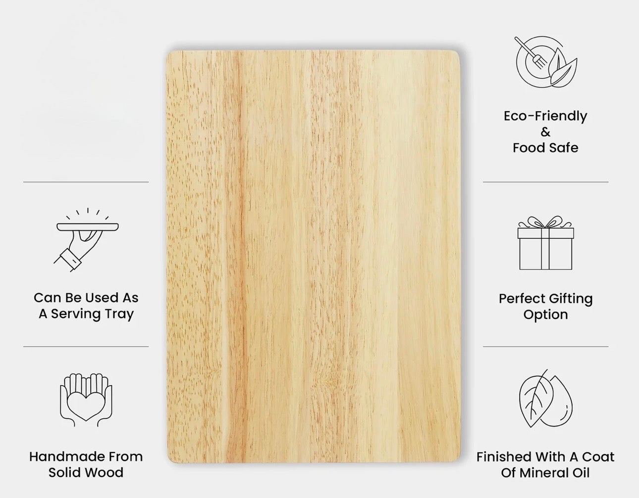 A rectangular light wood serving board or cutting board with vertical grain, centered on a light gray background with feature callouts around it. Text includes 'Eco-Friendly & Food Safe,' 'Can Be Used As A Serving Tray,' 'Handmade From Solid Wood,' and 'Finished With A Coat Of Mineral Oil.